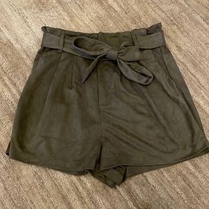 Green suede shorts with belt